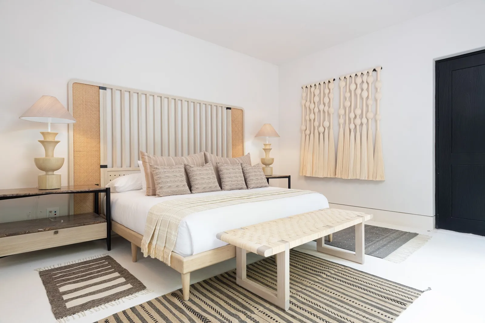 Garden View Suite 7: the bed and the garden door