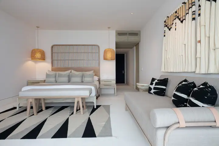 Ocean View Suite 4: the king bed and a sofa