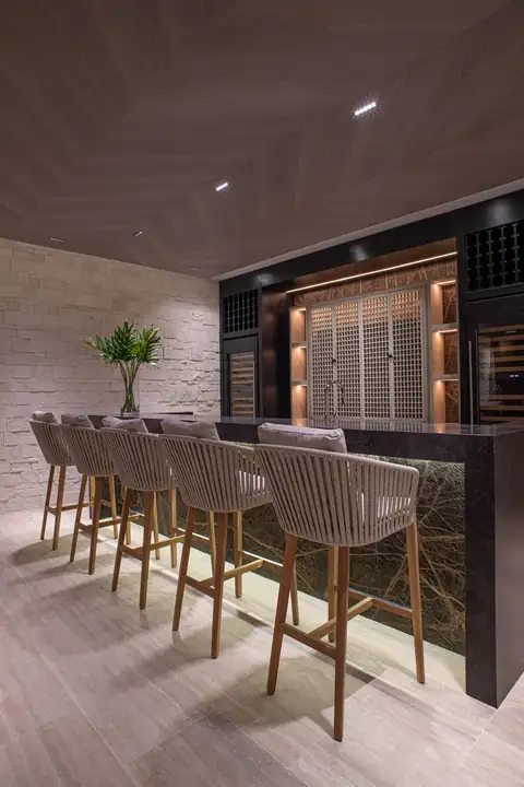 The bar counter and stools in the pub
